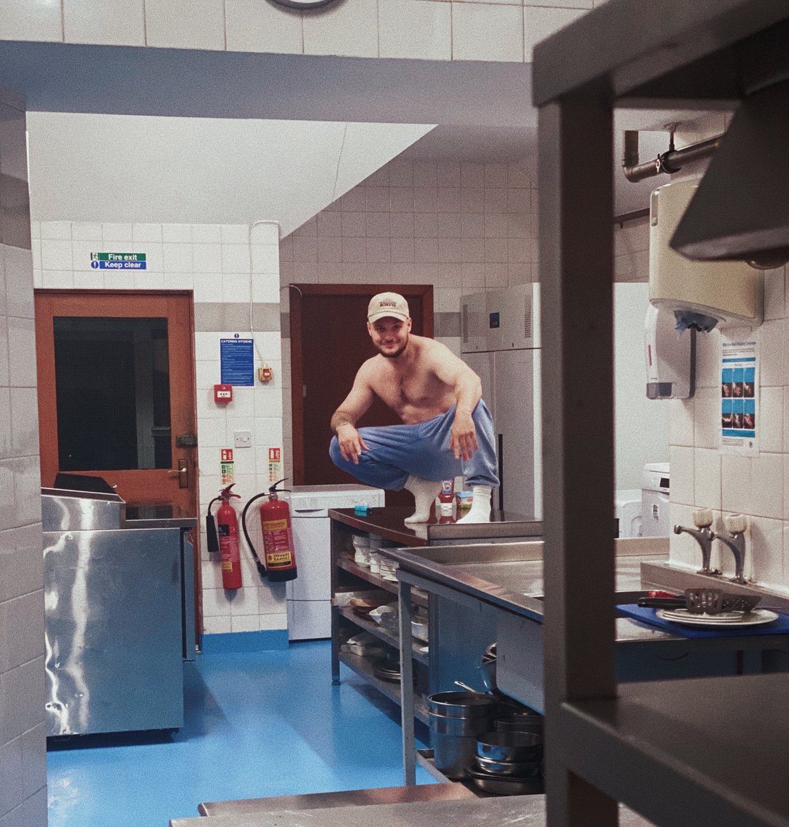 JaySwingler's tweet photo. you walk into the kitchen of a restaurant to complain because your food was served to you freezing cold, and I’m stood on the counter like this https://t.co/h64FdRQ35L