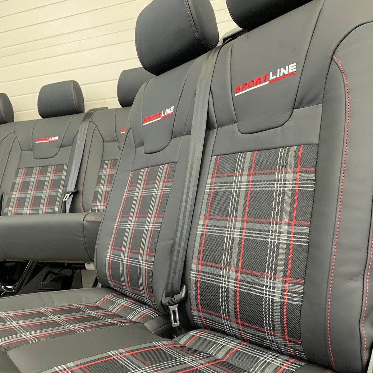 VisionLeisure's tweet photo. ‘Recaro upgrade’ T5/T6 single drivers seat (unfortunately no photo of) along with a twin and a rear kombi triple to match. ‘Sportline’ logos embroidered into the backrests to match the customer’s Sportline van. #sportsline #vanlife #autotrim #autotrimmers #autoupholsteryandtrim https://t.co/jAuWtM72E5
