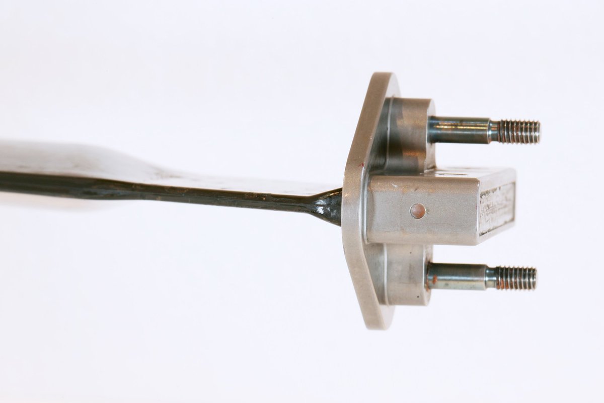 From the <a href="/ScarbsTech/">Craig Scarborough</a> workbench archive, Jaguar R4 #F1 carbon wishbone, with a flexure flexure joint rather a spherical bearing.