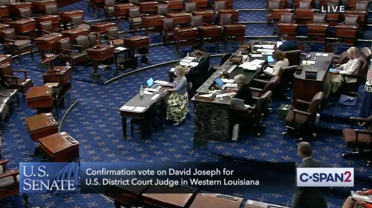 C-SPAN screenshot shows the Senate floor, where senators are voting on a judicial nominee.