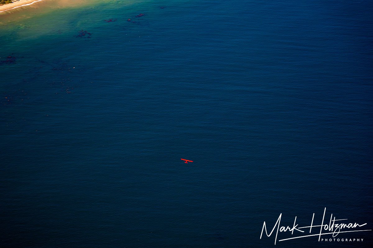 westcoastaerial's tweet photo. Flying over Malibu we spotted this bright red plane. Anybody have any guesses as to what kind of plane it is? #planespotting #pilotview #redplane #malibu #aerialphoto #aerialphotographer #california #californiasummer https://t.co/DTFdvtabU9