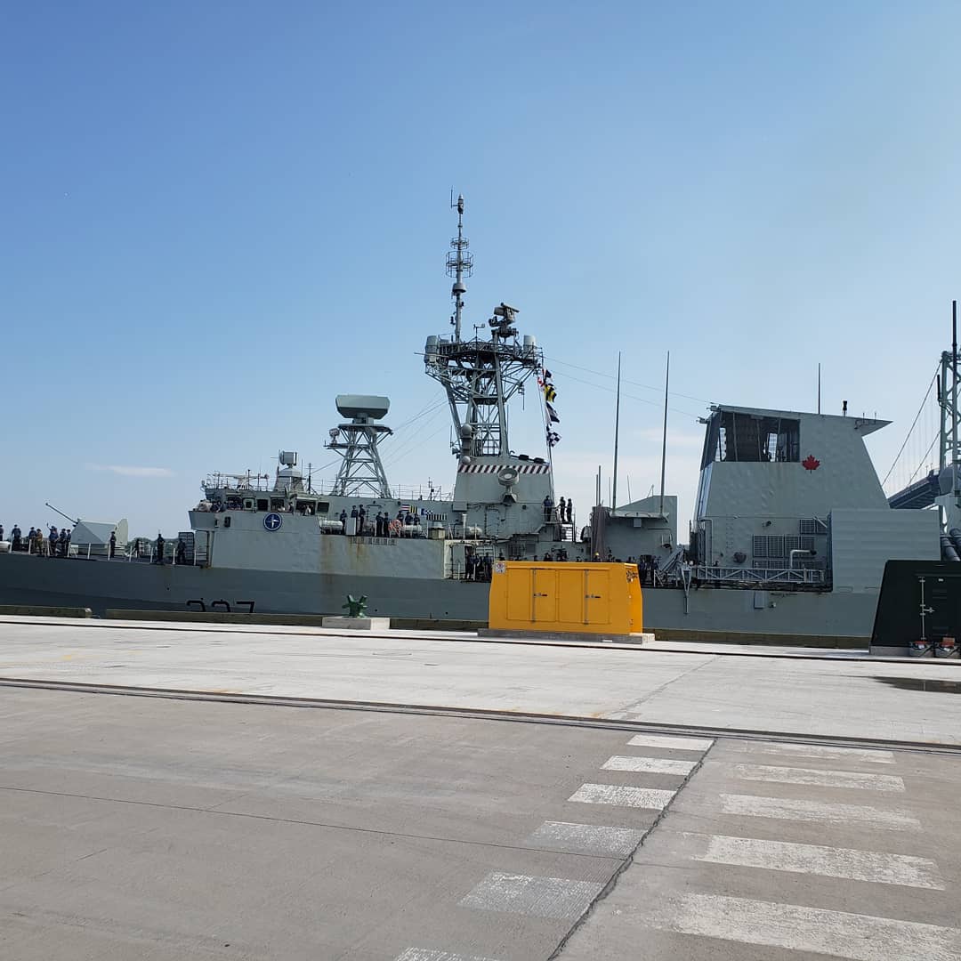 RCNintheUSN's tweet photo. And #HMCSFREDERICTON is home...the busses await. Thanks to all the dignitaries that helped welcome home Freddie today - a spectacular day all around. And thanks to the crew of the ship for their service over the last 6 months. Rest easy - see you in a few weeks. #halifaxbasecomd https://t.co/dHi6WqfDim