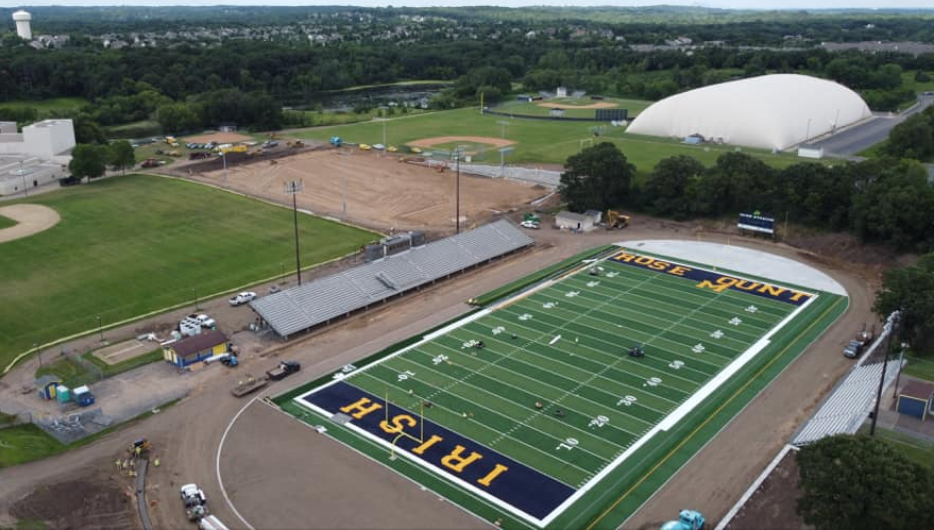 CoachErdmann's tweet photo. End zone lettering being added today!!! Thanks to Alex Huot for the photo! The 2nd turf field is also moving along well! https://t.co/8KFCYQZG8c
