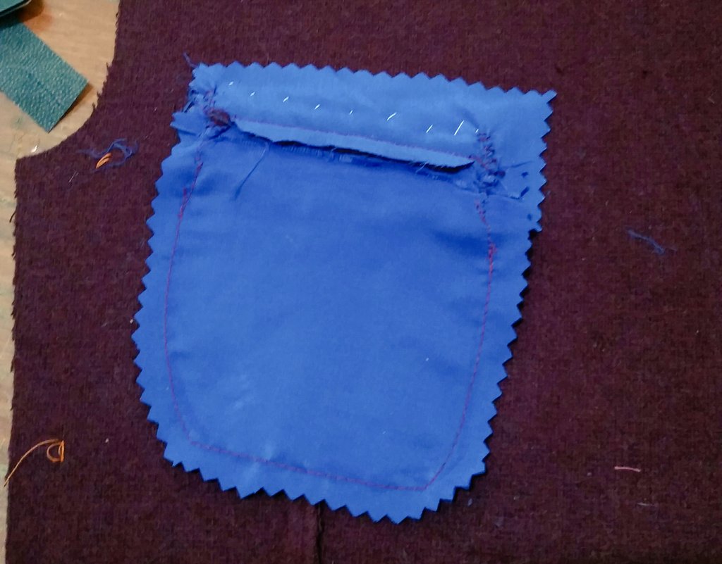 Ok, I did the darts, put in the ticket pocket and sewed the sides to the front. Gonna make dinner then maybe. Double welt pockets