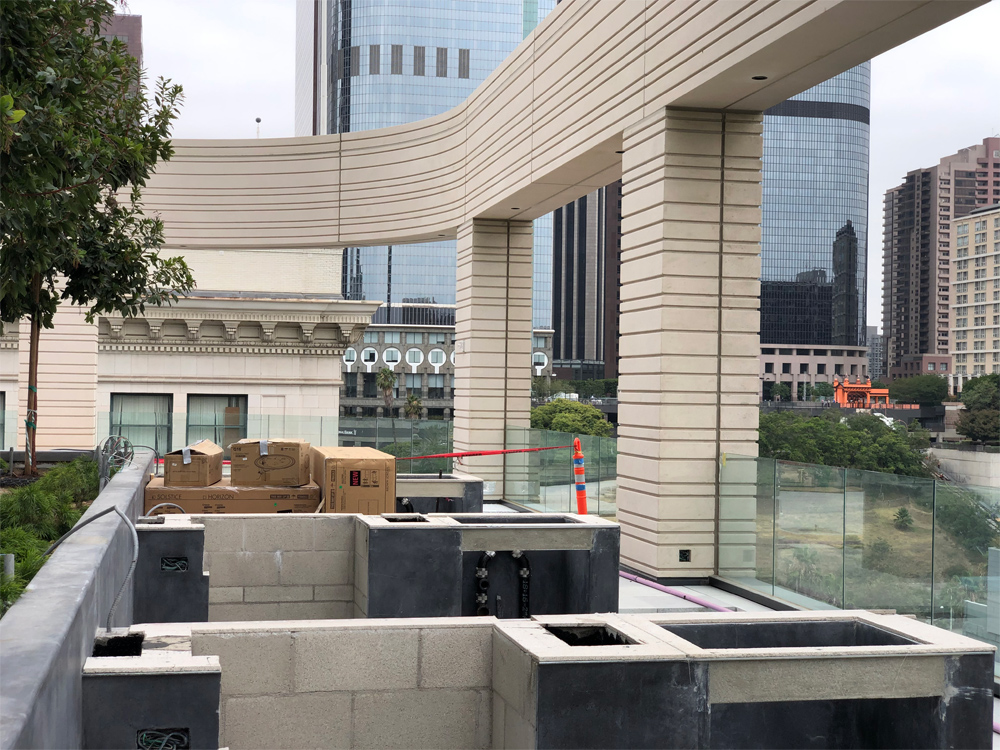 PerlaOnBroadway's tweet photo. Sneak peek. Say hello to your new outdoor grilling area – just a few months from now that is. Park-like landscaping with mature trees and spectacular city views from the 11th floor terrace. Your BBQ game just went next level. #ExcuseTheMess #UnderConstruction #PerlaOnBroadway https://t.co/KPoX0WEnFM