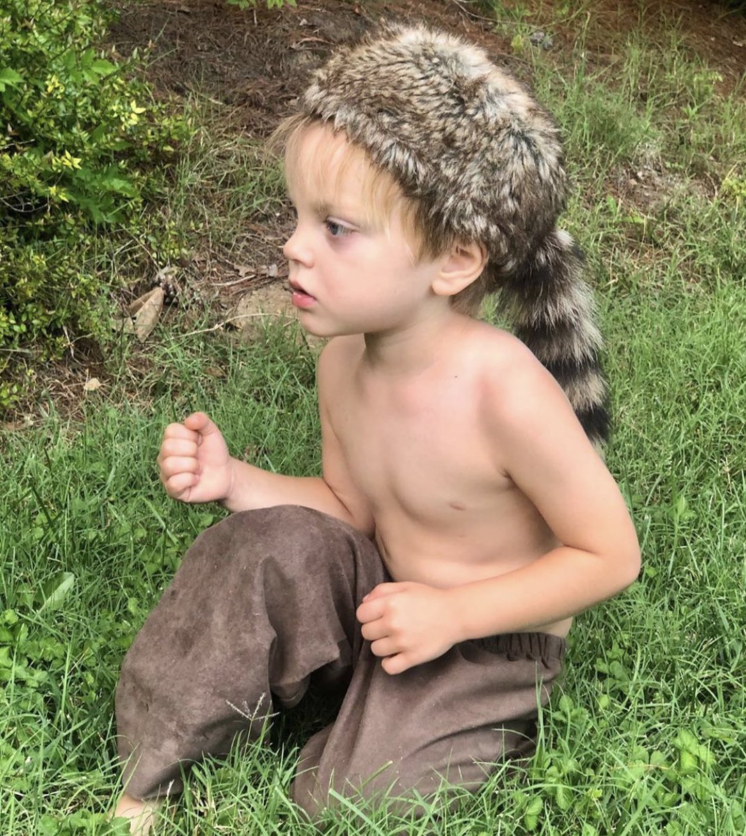 AdamSDeVault's tweet photo. We found Axel wearing an old costume his brother wore years ago. I had to give him my musket from UT to complete the look. @TennesseeCheer I found you a mascot. #likefatherlikeson https://t.co/60Yyi7Xo1b