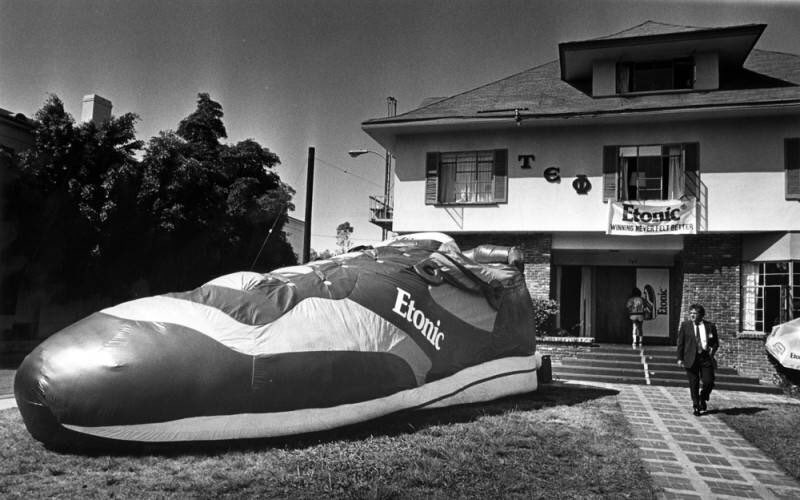Giant shoe in front of a fraternity house