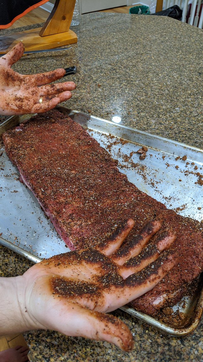 We use the St. Louis style ribs (got these from Costco) and slather both sides in our homemade dry rub. It's a lot of dry rub.