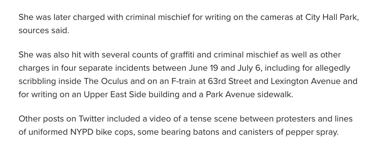 Update again: she was charged with graffiti and criminal mischief for writing on cameras, not stickering as was reported in the thread atop this thread. Not any destruction of property. Just graffiti that apparently required the warrant squad terrorizing a peaceful march.