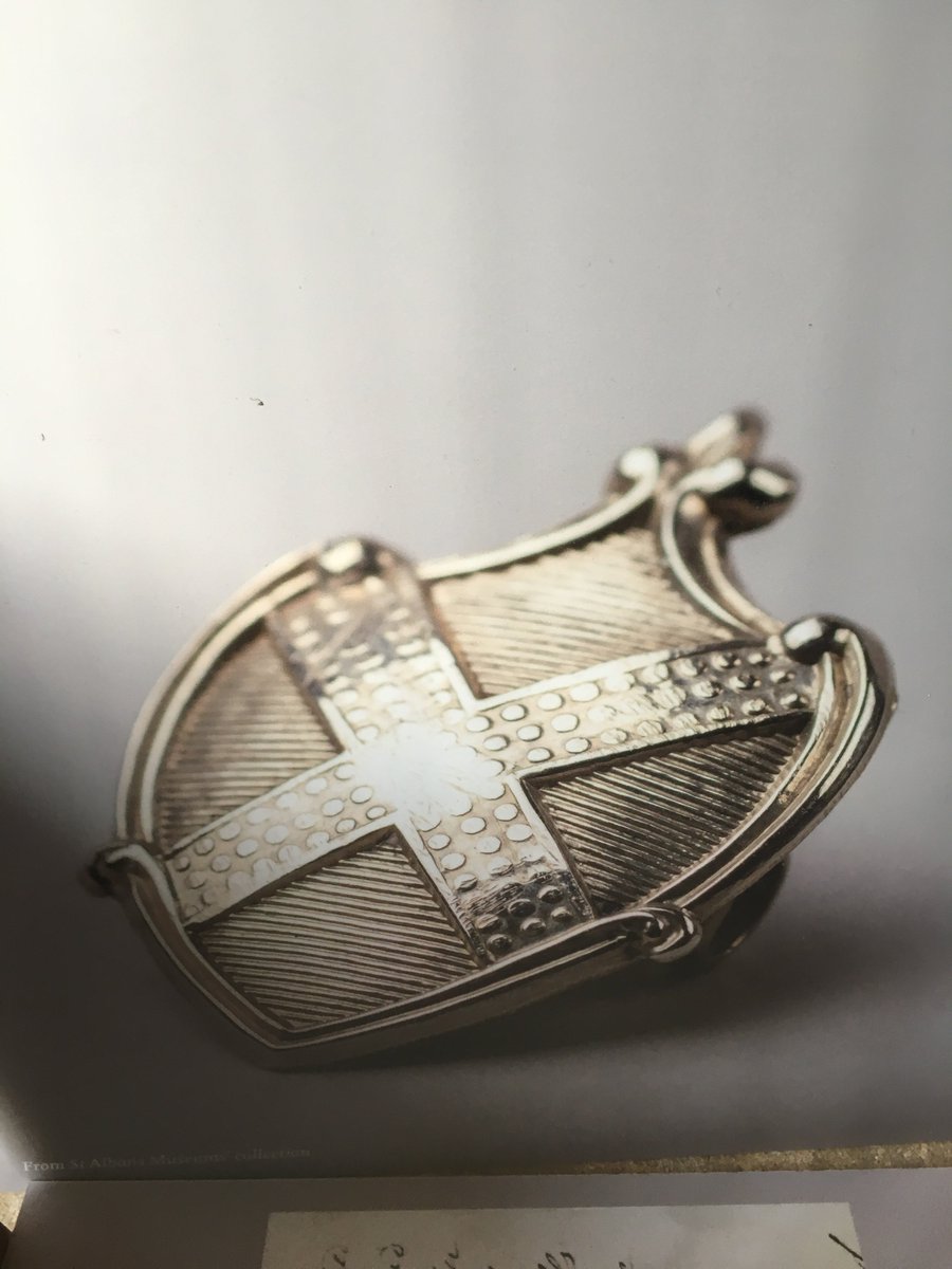 The composition of the logo came about after a trip to the city museum and I saw these versions of the St Alban cross: