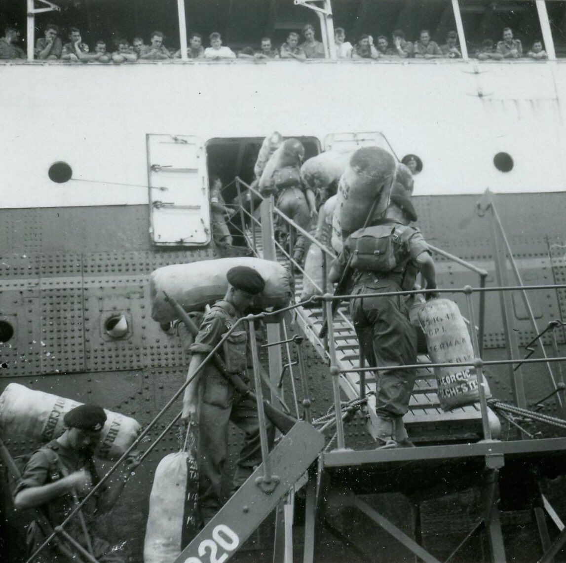 ...Roll forward to 1953 and 1st Suffolk were coming home from Malaya. Their troopship docked at Liverpool, where at that time Sir John was conducting with the Halle Orchestra. Keen to show his appreciation of their efforts, Sir John went to the docks to meet them...