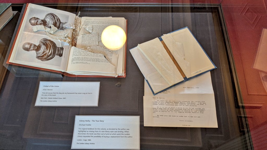 amazingMeagen's tweet photo. New display installed on what can happen to library books including unacceptable annotations, bomb damage and animal interventions from Peter, @ArchivistNLB and #CollectionCare @TheLondonLib #ExhibitionInstallation https://t.co/M6ZMyOXCJz