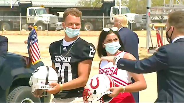 Mark Knoller (@markknoller) on Twitter photo Pres Trump greeted by <a href="/GovAbbott/">Greg Abbott</a> on arrival in Midland, Texas. Everyone wearing a mask except the president. Receiving line included version of Friday Night Lights, as Pres signed helmets for Odessa and Permian HS football teams. Pres Trump greeted by <a href="/GovAbbott/">Greg Abbott</a> on arrival in Midland, Texas. Everyone wearing a mask except the president. Receiving line included version of Friday Night Lights, as Pres signed helmets for Odessa and Permian HS football teams.