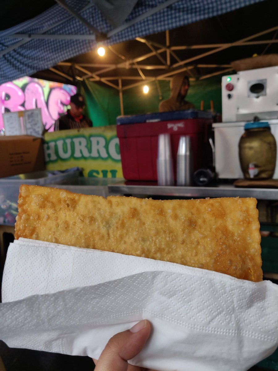 Brazilian pastel at a street stall near Notting Hill Gate In one of the episodes of  #PartsUnknown Anthony Bourdain says that deep-fried food is the backbone of any street fair in the world. How I agree. This deep-fried dough has a filling of minced chicken and cheese.
