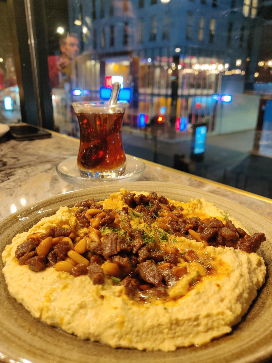 Humus Kavurma at Kervan SofrasiOne of the best Turkish restaurants in London in my opinion. This dish of warm humus with spices lamb and pine nuts is probably my favourite. I don't want to eat humus any other way after eating this.