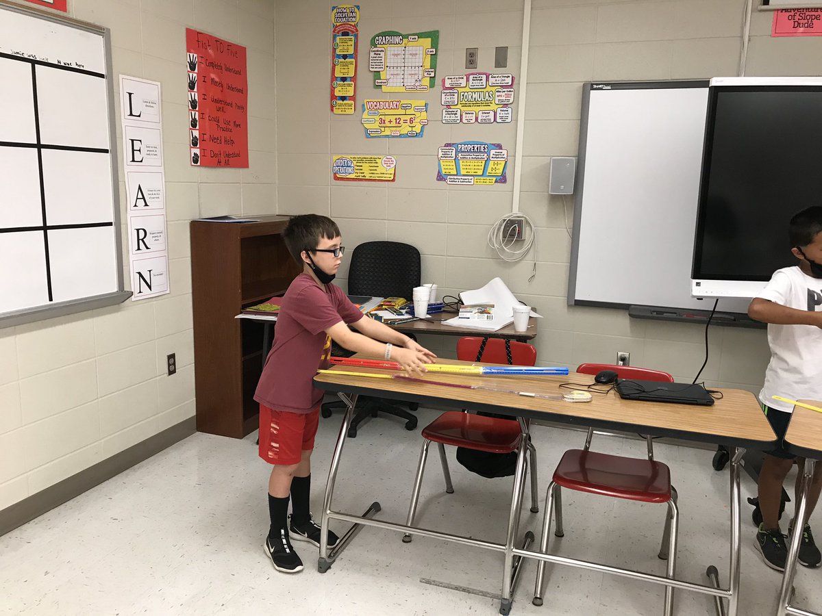 Morning fun at AMS #summerschool2020!! - Social distancing measurement: Each student taped two sets of three rulers together, then we stood so that only rulers touched for six feet.  #RedbirdProud