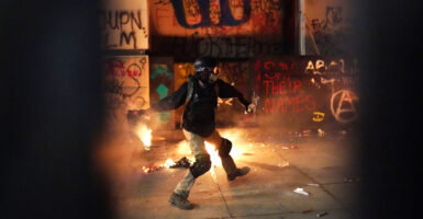 The strategy is assault on the building—and when agents come out to put out fires or fix the fence they viciously attack the agents. Over 200 federal officers have been injured and over 90 arrests have been made.