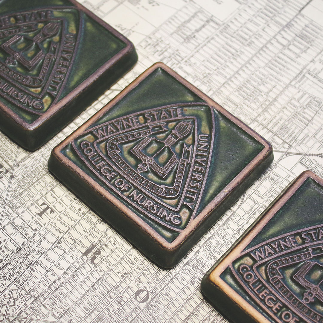 A gorgeous Pewabic WSU Nursing tile is now available through the <a href="/wsubkstore/">WSU Bookstore</a>! Celebrate the college with a hand painted 4x4 tile featuring its seal. Proceeds support the College of Nursing. The tile is available in store and online w/free shipping: wayne.bncollege.com/shop/ProductDi…