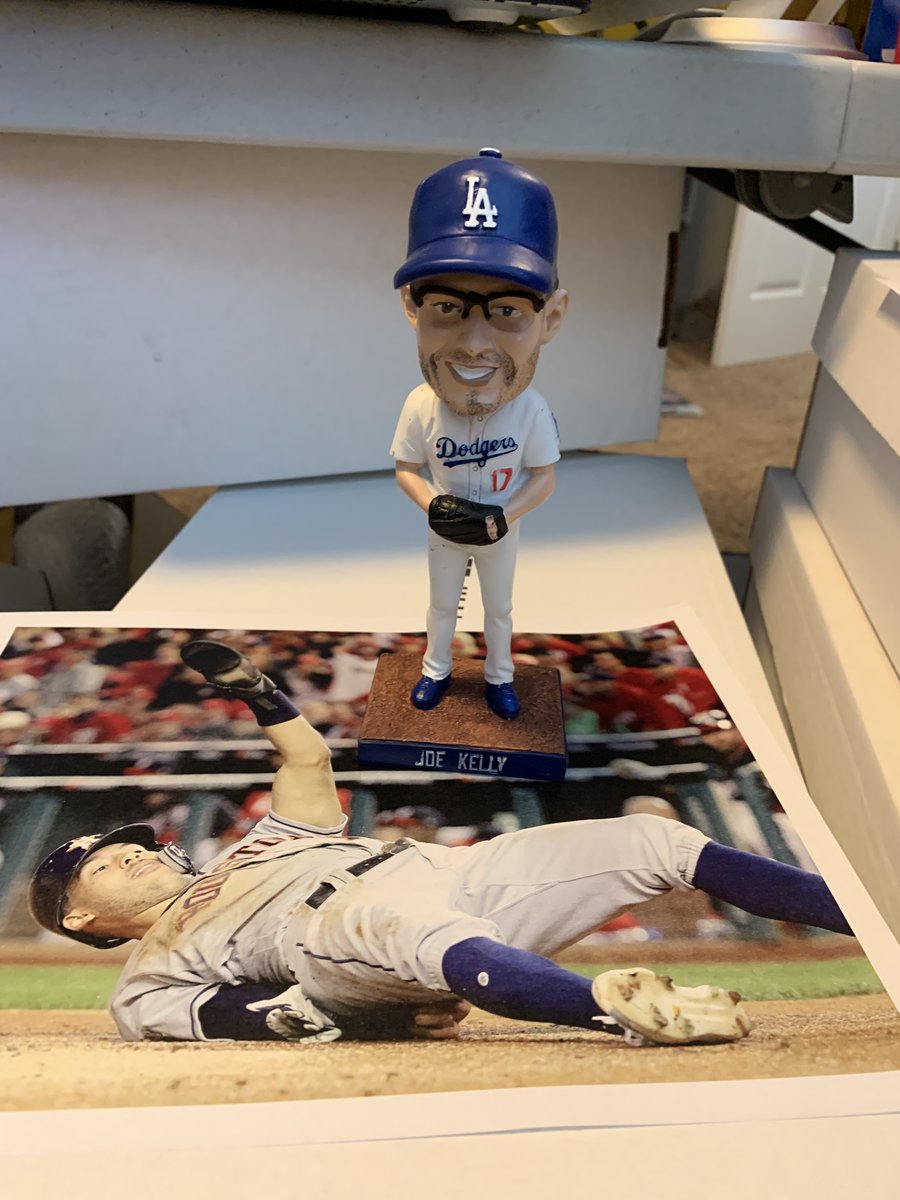 What's the second rule of Joe Kelly Fight Club? "Give away a bobblehead!"

For a chance to win this Joe Kelly bobblehead, all you gotta do is RT this and follow us.

(And if you want to go ahead and listen to our show every weekday morning, even better.)

Winner on Friday night.