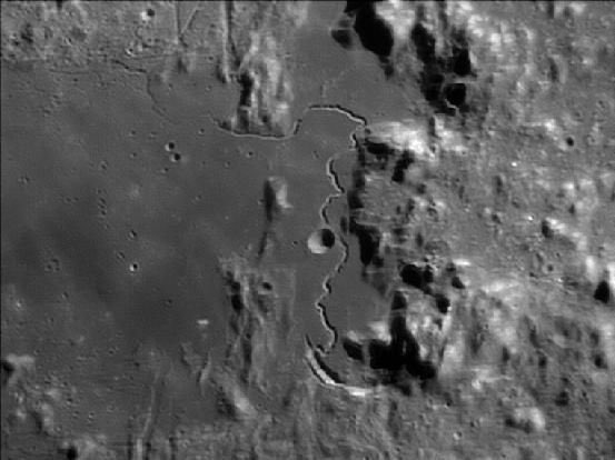 12) Finally, I saved the best for last. At the very beginning of the video, look for Hadley Rille. It is a long, sinuous channel that formed ages ago in the Moon’s geologic history. The view is SO COOL at this angle flying in. Here is a top-view image.