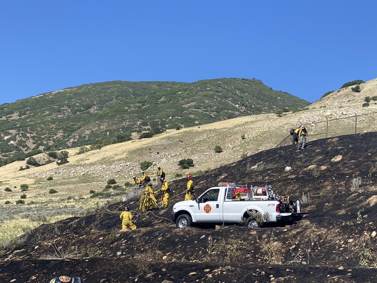 SDMFA's tweet image. Quick work by our firefighters extinguished a brush fire on the mountain in Centerville. Just above Center St, fireworks started the mountain on fire. The fire was quickly extinguished, burning about 2 acres. The responsible party is cooperating with the investigation.