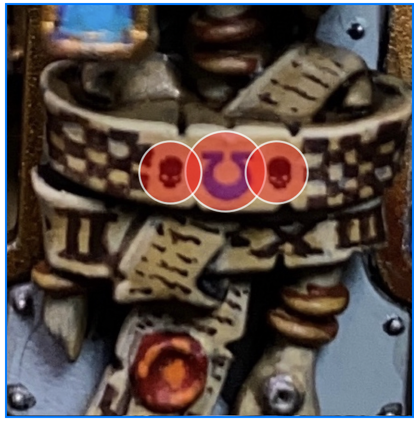 (5/7)Shield transfers There are three transfers needed to be applied on the strip. However, the transfers have an opaque area that can mess up the other transfers. So make sure you finish up the centerpiece and seal it with Latham medium first, and work on the other two after.