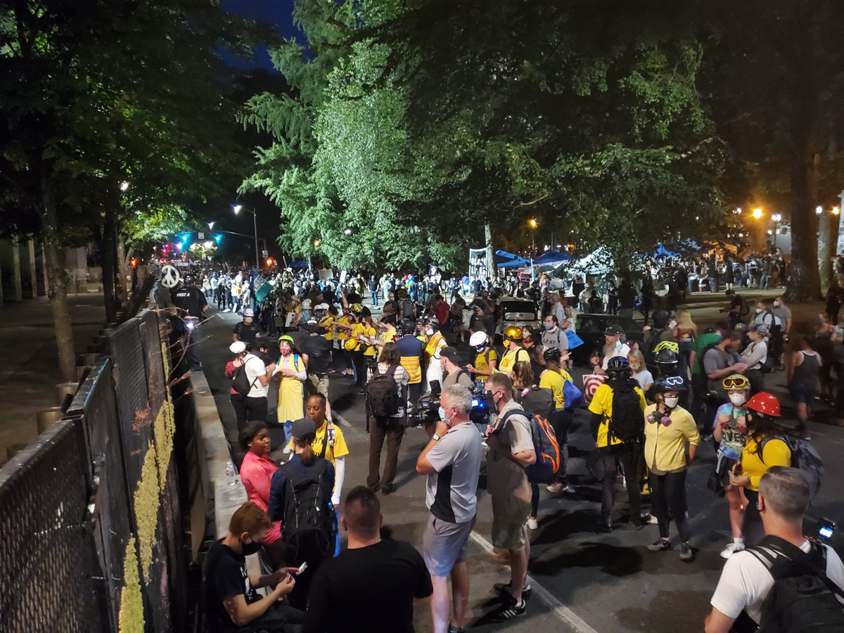 Several hundred people in the parks/street in front of the Justice Center and federal courthouse right now.