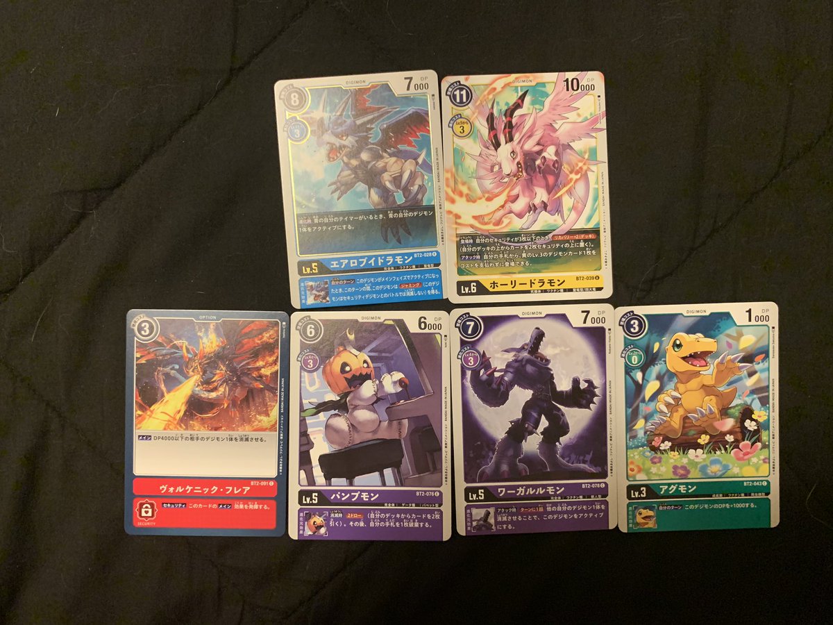 Some other packs from tonight, now that I have 2 more boxes secured and am not afraid of running out soon (this Guilmon kind of terrifies me)