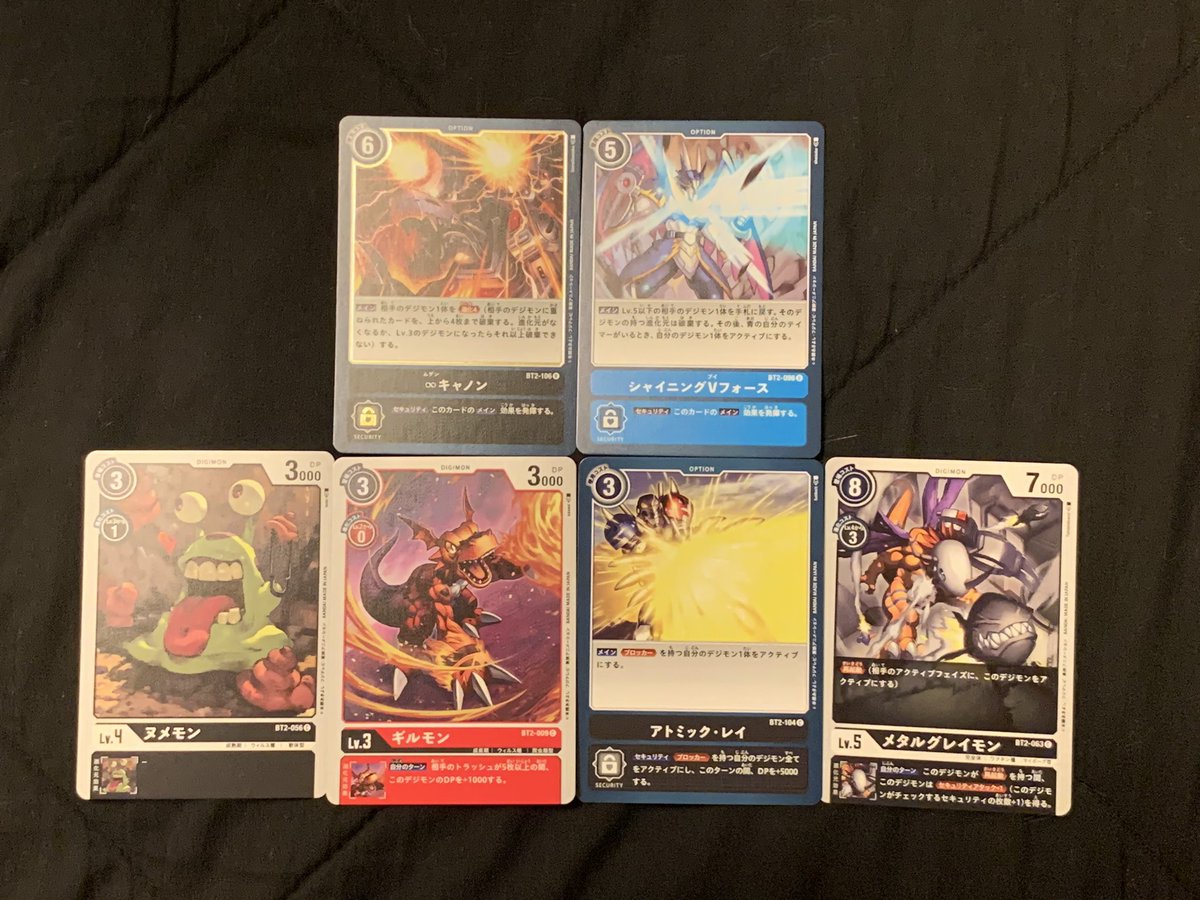 Some other packs from tonight, now that I have 2 more boxes secured and am not afraid of running out soon (this Guilmon kind of terrifies me)