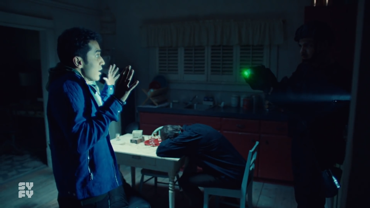 The door is "kicked" open. More likely it was manually opened by the person just off-screen holding the flashlight up in Jeremy's face. (Yes, there is a second person in that doorway)Let's hope that knife isn't sharp as Jeremy drops it DANGEROUSLY close to Nicole's head.