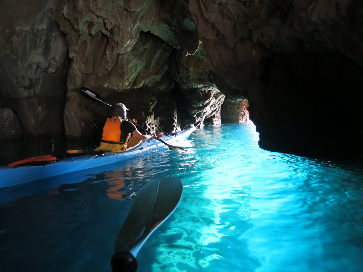 Nwpassagecom's tweet photo. There ain't no editing going on to make that electric blue water POP the way it does. 

That captivating color comes from light that filters through an undercut sea cave. This Blue Grotto is one of many unforgettable surprises our Crete Kayak Adventure.

https://t.co/YkNoHRS78G https://t.co/iOJlQlN0Xl