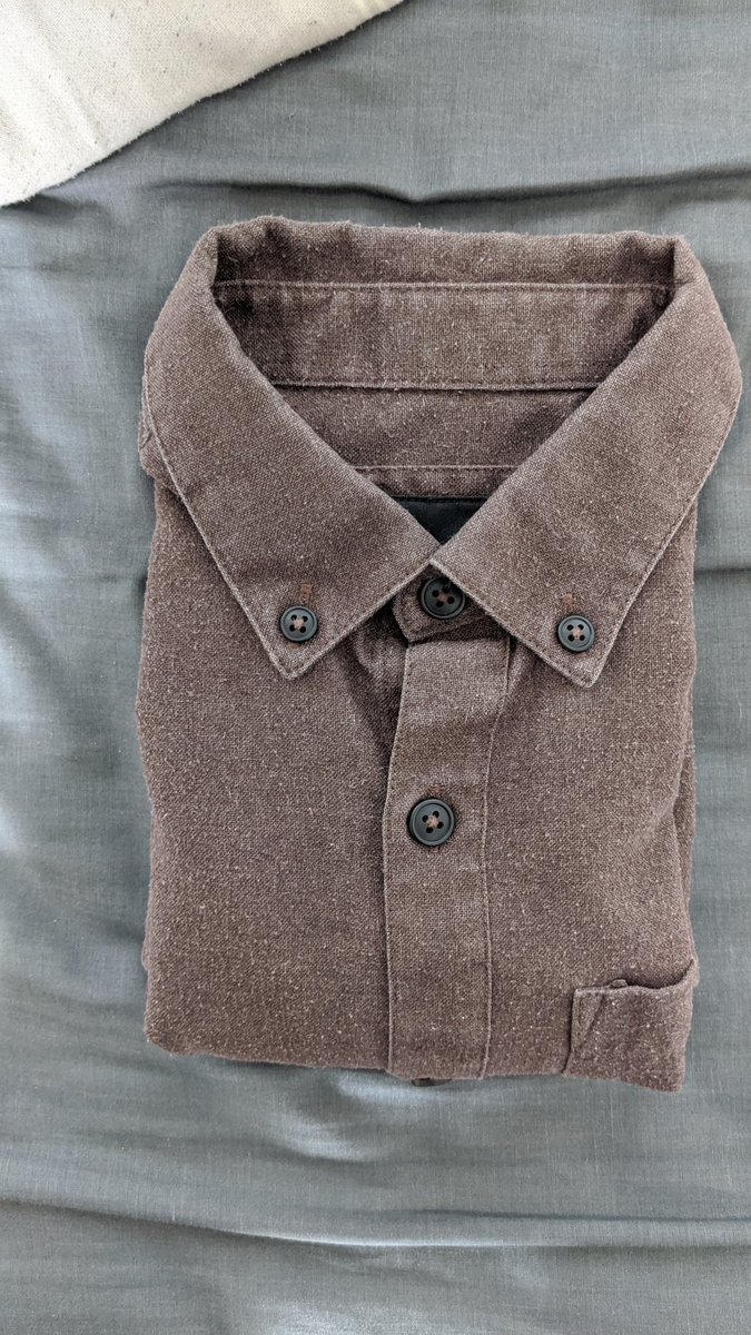 Enjoy your perfectly folded shirts.I've owned that brown shirt for over five years and never ironed it because I fold, wash, dry, and store all my shirts carefully so that I don't have to iron them. Because ironing sucks and I refuse to do it.