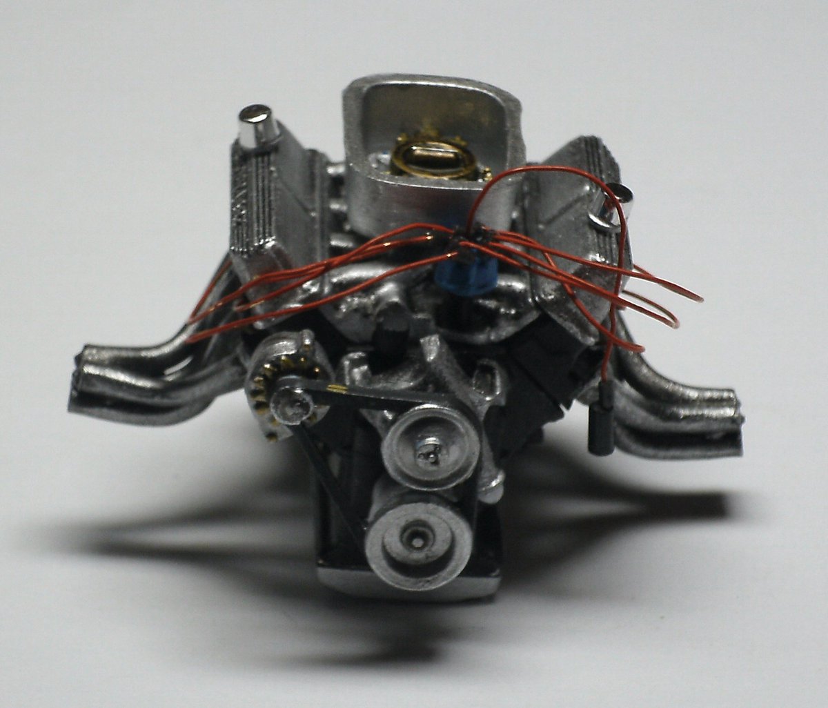 HirakawaDavid's tweet photo. Today's is a Shelby Cobra driven by Sam Feinstein. This was my first ever attempt at engine wiring. #HirakawaStudios #Revell #Shelby #Cobra #SamFeinstein #Scalemodel. https://t.co/5lo9j2otve
