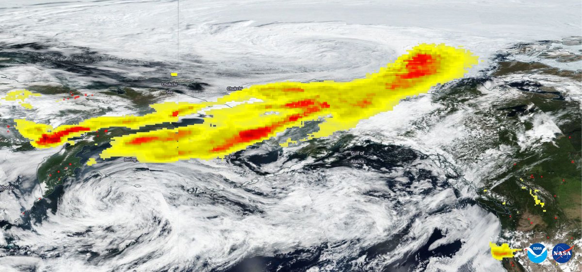Satellite image of Siberia and Alaska with a swath of smoke aerosol particles highlighted in yellow and red