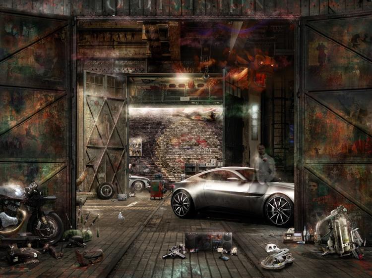 'Q' Division (Bond)- Deluxe Edition Limited Edition Print
Framed size: 86 x 107 cms  RRP: £495.00
Each of Mark’s editions supplied through Gallery 21 come complete with our own stunning framing.

This price of £495 is for: The Deluxe Large Paper Edition with only 20 pieces available worldwide.

It’s mainly based on the Daniel Craig set of films, being that this is his final year as Bond. You can see him there, ghosted out against the Aston Martin DB10 and just at the back, behind the DB5 you can see his boss ‘M’ and that’s the concept that there are all of these objects laid out before her as she reminisces about their time in service together.