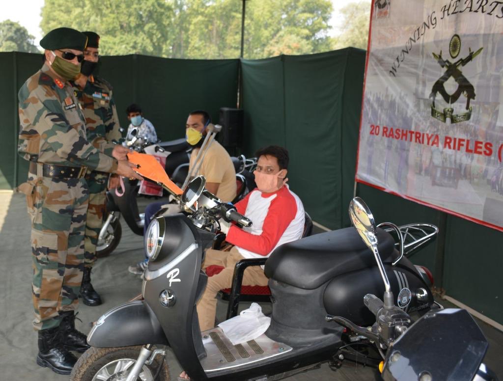 Indian army distributed E-scooters to the physically handicapped Kashmiris. #Kashmir hats off to Indian army and salute to their kindness. #IndianArmedForces #indianarmyzindabad