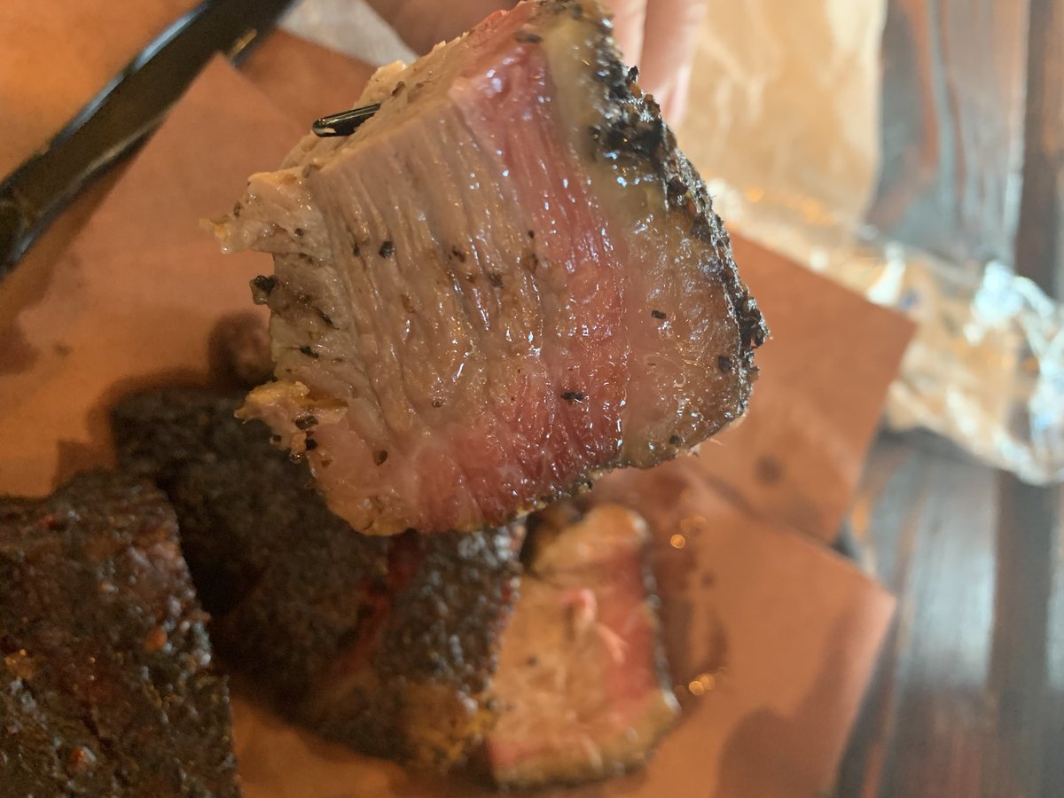 JasonOShell's tweet image. Believe the hype! @eviemaesbbq is the real deal. Brisket burnt ends and pork ribs with green chili grits was perfect. Look at that smoke ring!!💨