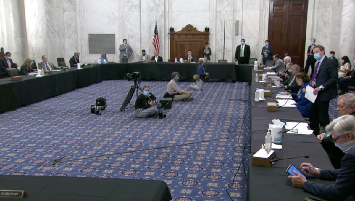 Screenshot of the Senate Judiciary Committee room, where members are voting on judicial nominees.