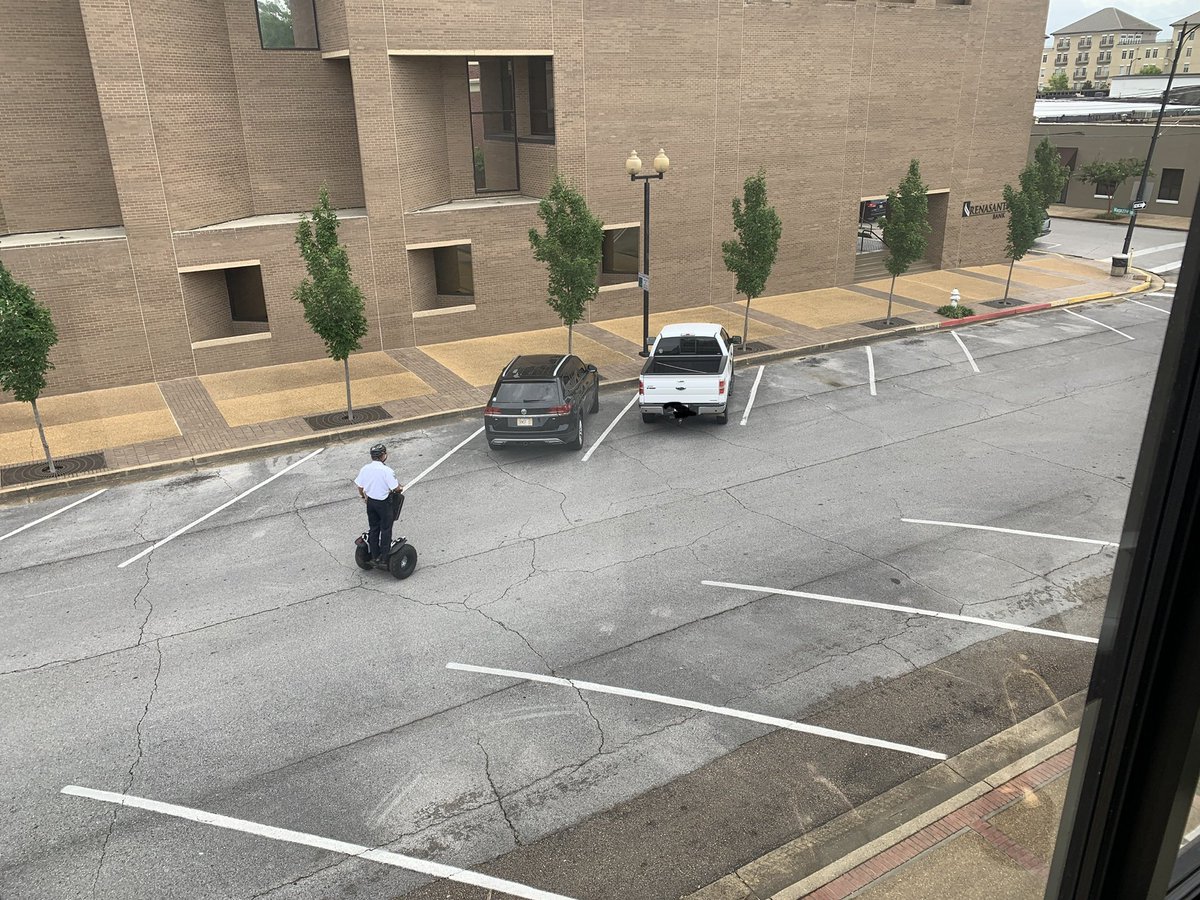 Caught in the act! Protecting all those parking spots.  #taxmoneyatwork