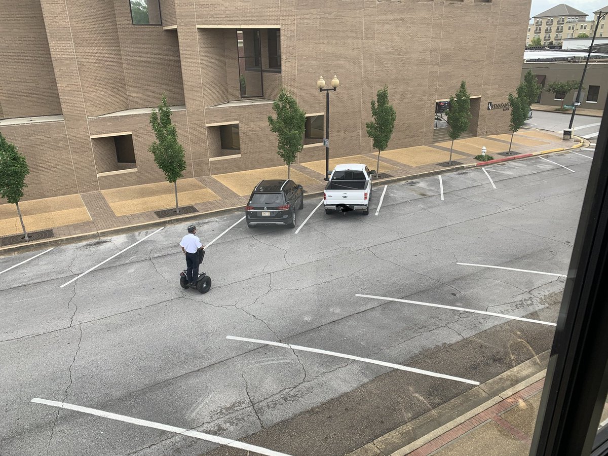 Caught in the act! Protecting all those parking spots.   #taxmoneyatwork