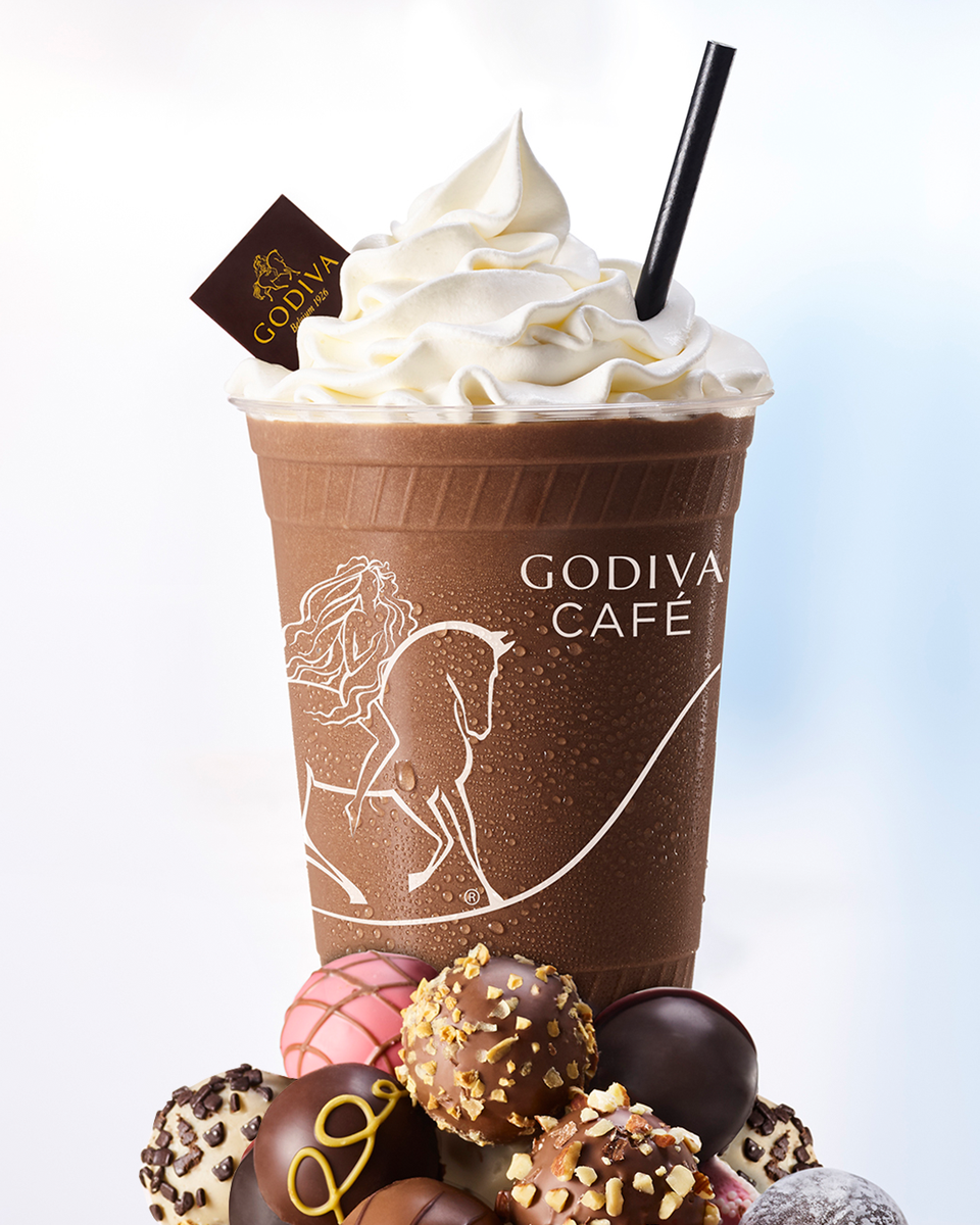 GODIVA's tweet photo. Introducing, our new Handcrafted GODIVA Shakes. 😍 The best part? We can blend in your favorite GODIVA truffle with our #TruffleUp boost! Download our app to order from your local Café or Boutique. https://t.co/RCzA1hNP10