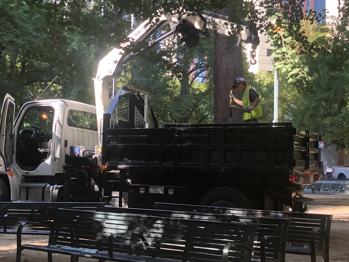 Lonwsdale and Chapman squares being cleared at the request of Oregon State Police. Groups of Portland Police officers are stationed at every corner around Chapman Square.