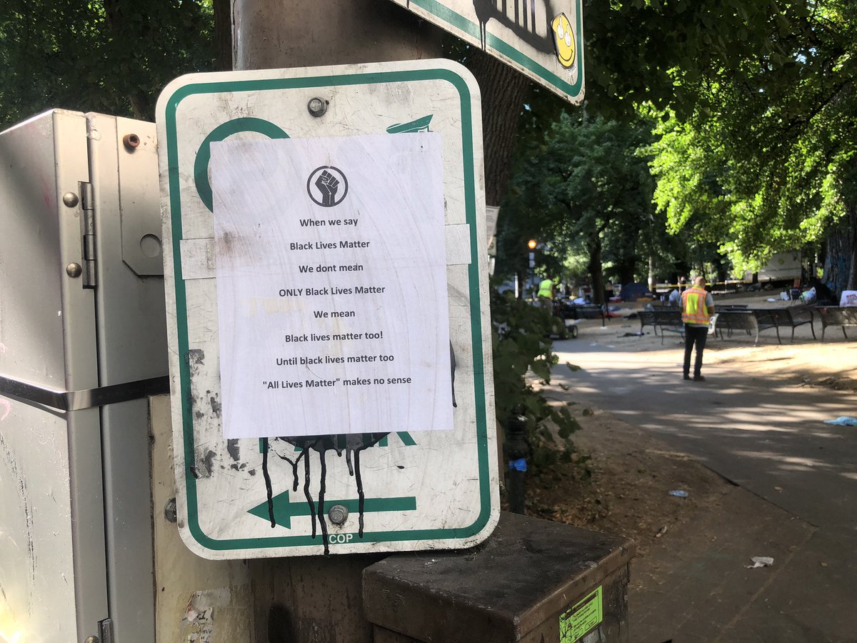 A park closure sign, along with some others around the park. &ndash; bei  Chapman Square