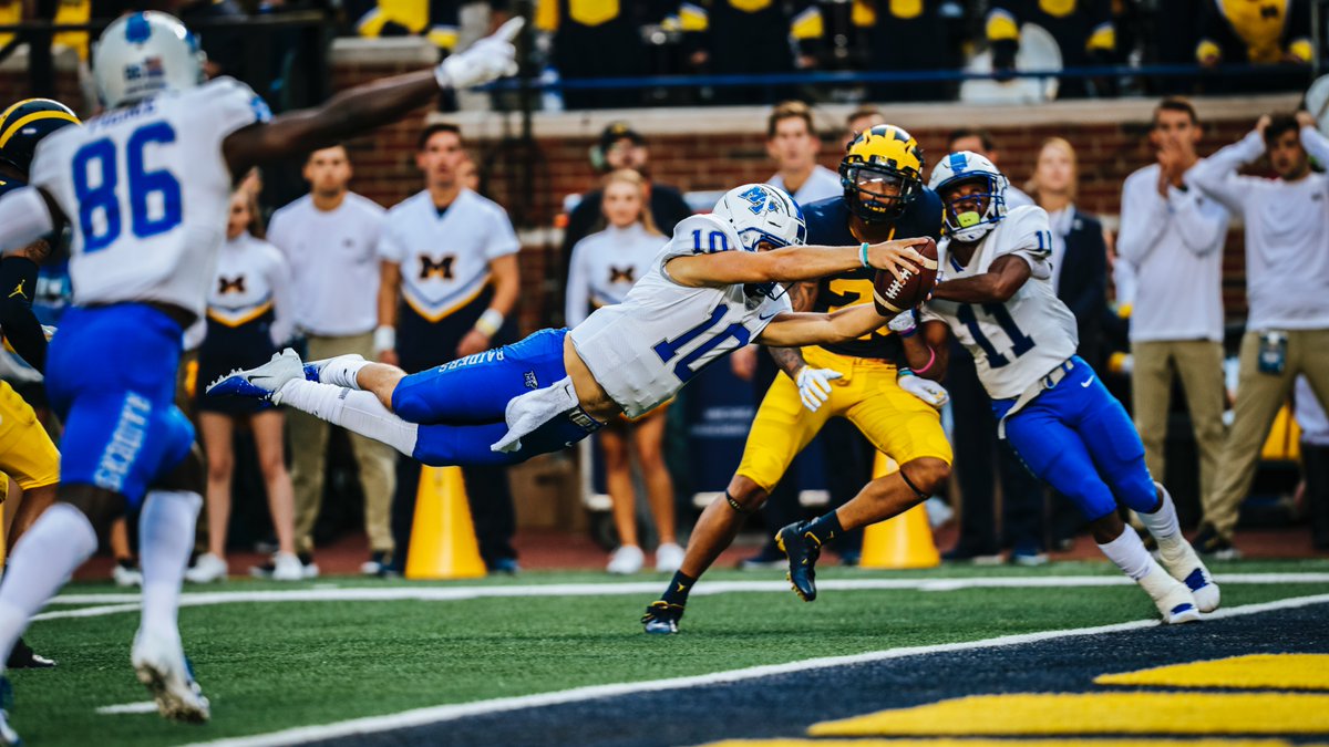 MTAthletics's tweet photo. Blue Raiders’ Top Photos of the Year
@mt_fb “Top Dive”
Asher O’Hara showing the competition what True Blue means in the first game of the season at Michigan.
📸: Nathan Wallach
📅: 08.31.2019
#BlueRaiders | #MT https://t.co/POr7sdeJHI