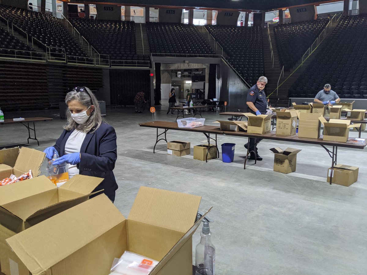 UTPolice's tweet photo. We’re 20 days from the start of the fall semester @UTKnoxville! This week our officers helped put together wellness kits including face coverings that UT will provide for every member of the campus community. Excited to see our Vols soon! https://t.co/rnlD21q0hr #VolSafety https://t.co/0Bxfjx18Cx