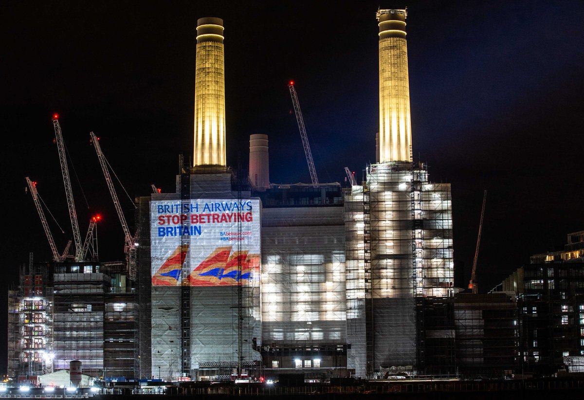 WorkerStrikeBck's tweet photo. Battersea Power Station has been brought back to life tonight with our message to both the UK &amp; Spanish Govt. @BorisJohnson needs to act on BA's landing slots &amp; the Spanish Govt. need to realise that their state aid to #IAG is funding UK #fireandrehire &amp; purchase of @AirEuropa https://t.co/o2WAgCYVp8