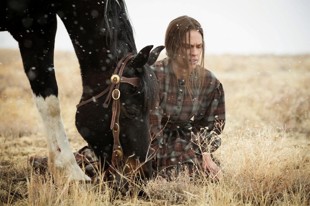  Hilary Swank as Mary Bee Caddy in Tommy Lee Jones film The Homesman, 2014
Happy birthday! 