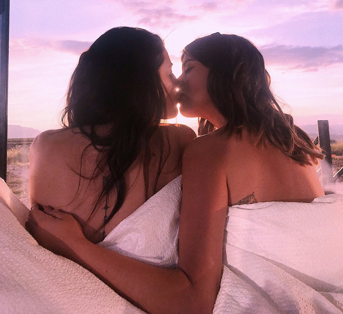 Lesbian Couple Moving Into A New Apartment Stock Photo.