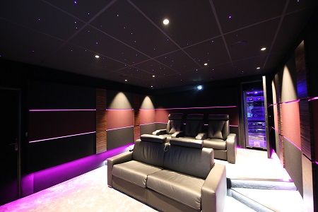 CEDIA's tweet photo. The client who commissioned this cinema wanted his two “dream toys” side-by-side. That’s why this dedicated home theater is right next to the space that holds his Ferrarri. https://t.co/4UuyuIKIA6 https://t.co/ug1MnE2ICv