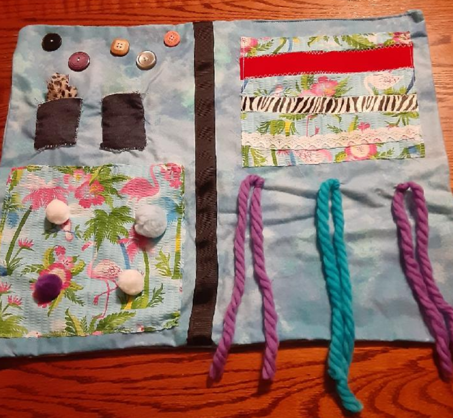 RoadRulesCamp's tweet photo. Lots going on today! Elizabeth finished up her fidget quilt, Daniel made a mask, and Sara worked on one of our missions: leaving positive notes on cars! https://t.co/dKAwnOPvvo